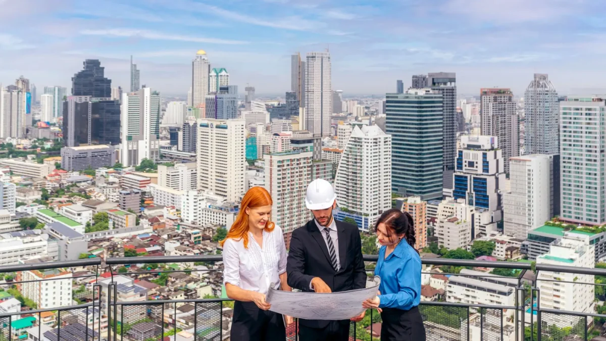 Architecture customer and engineer discuss and meeting on site together on the condominium in Bangkok