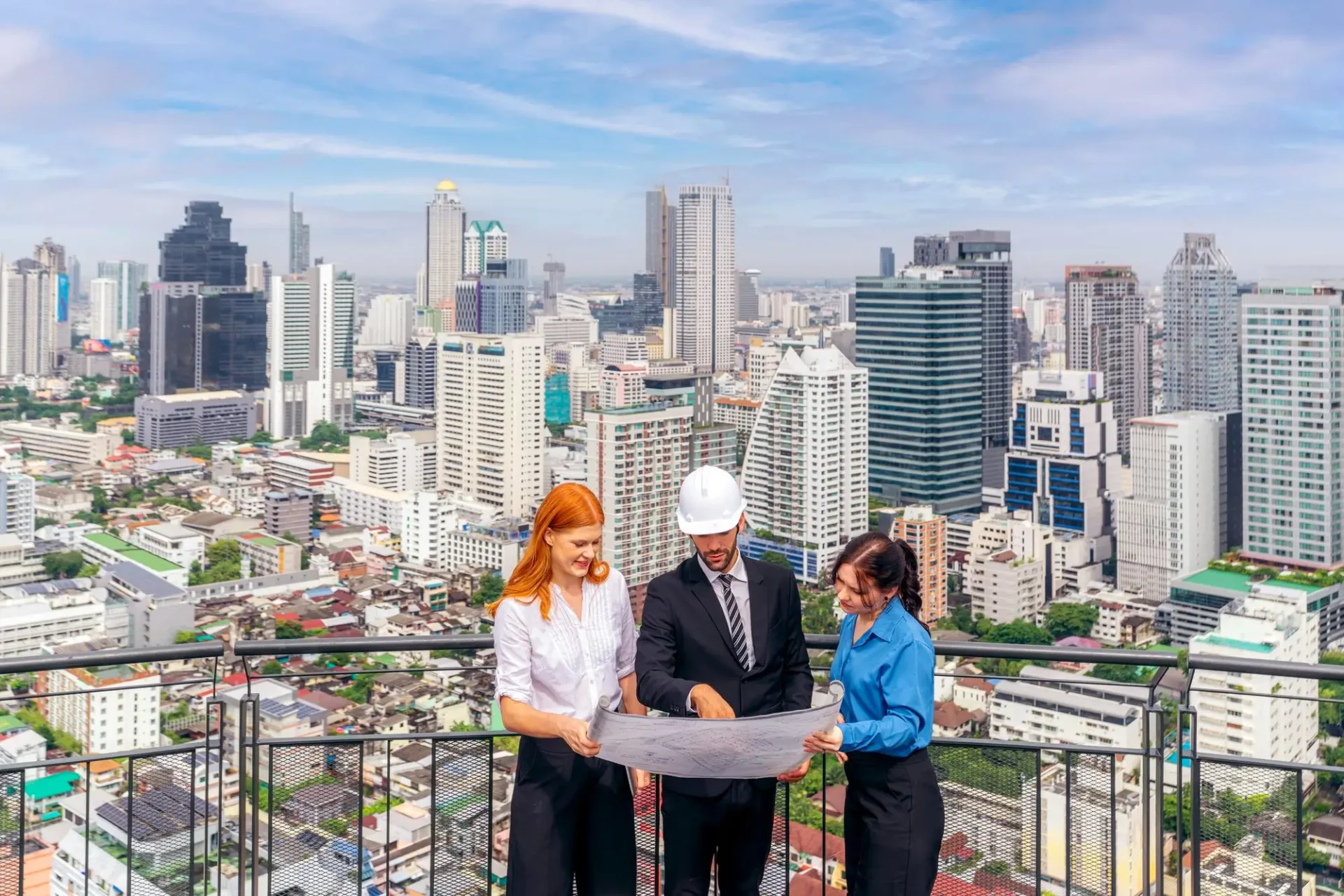 Architecture customer and engineer discuss and meeting on site together on the condominium in Bangkok